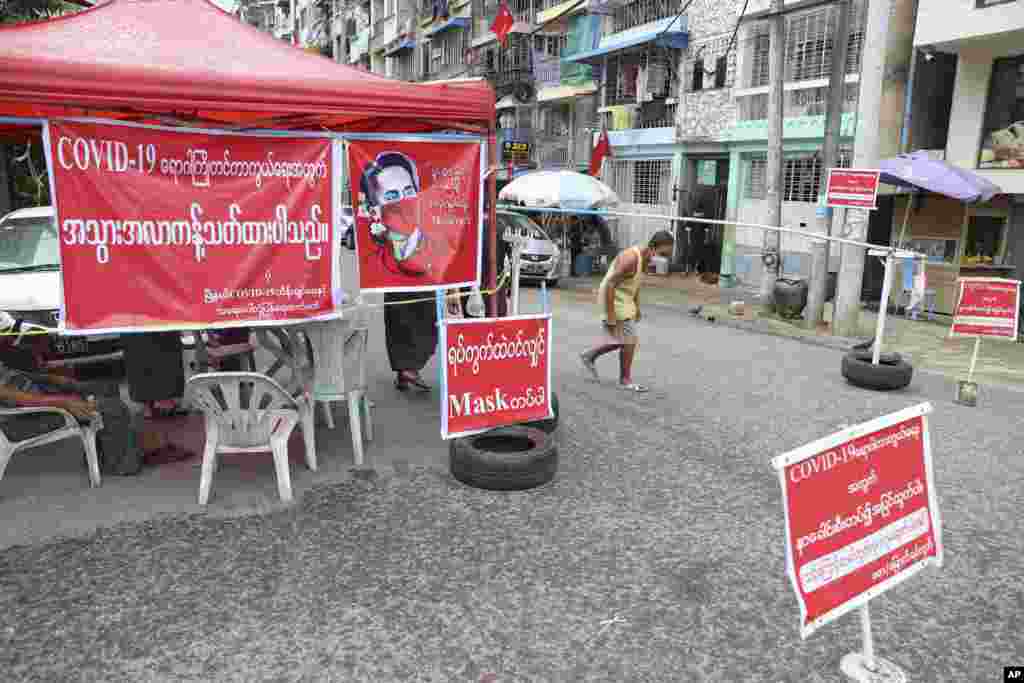 ကိုရိုနာဗိုင်းရပ်စ် ကူးစက်ပျံ့နှံ့မှု တိုးနေတဲ့ ရန်ကုန်မြို့မှာ အသွားအလာ ကန့်သတ်ပိတ်ဆို့ထားတဲ့ လမ်းတခု။ (စက်တင်ဘာ ၁၁၊ ၂၀၂၀)