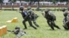 FILE - Taiwanese soldiers take part in a military training session in Taichung, Taiwan, on June 28, 2024. Taiwanese Premier Cho Jung-tai said on July 17, 2024, that the island is willing to spend more on its own security.