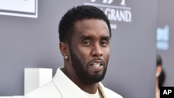 FILE: Sean "Diddy" Combs arrives at the Billboard Music Awards in Las Vegas on May 15, 2022. The network announced then that Combs would receive the Lifetime Achievement Award on June 26, 2022.