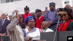 FILE - In this picture taken from video, Liberia's new President Joseph Nyuma Boakai, front left, is sworn into office in Monrovia, Liberia, January 22, 2024,