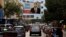 A poster of outgoing Prime Minister Saad Hariri hangs on a street in Beirut, Lebanon, Nov. 6, 2017. 