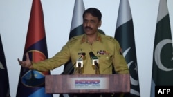 FILE - Pakistan's army spokesman Major General Asif Ghafoor speaks during a press conference in Rawalpindi on April 17, 2017.