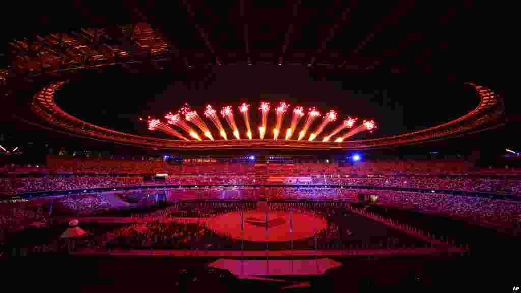 Fireworks explode following the closing ceremony in the Olympic Stadium at the 2020 Summer Olympics, Sunday, Aug. 8, 2021, in Tokyo, Japan. (AP Photo/Vincent Thia