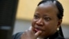 In this Nov. 27, 2013, file photo, prosecutor Fatou Bensouda waits for the start of the trial at the International Criminal Court (ICC) in The Hague, Netherlands. 