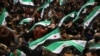 Syrians attend a gathering to mark 13 years since pro-democracy protests swept the country in the rebel-held city of Idlib, in northwestern Syria, on March 15, 2024.