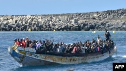 Migrants arrive on a boat at La Restinga dock, in the municipality of El Pinar on the Canary Island of El Hierro, on Oct. 21, 2023.