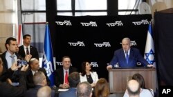 Israeli Prime Minister Benjamin Netanyahu deliverers a statement at the airport city in Lod Israel, Dec. 27, 2019.