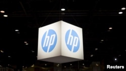 FILE - The Hewlett-Packard (HP) logo is seen as part of a display at the Microsoft Ignite technology conference in Chicago, Illinois, May 4, 2015.