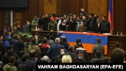 ARMENIA -- Protestors against the end of war in the Nagorno-Karabakh are seen inside the building of the National Assembly of the Republic of Armenia (Armenian Parliament) after storming the building, in Yerevan, Armenia, 10 November 2020.