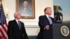 President Donald Trump speaks about the shootings in El Paso and Dayton as Vice President Mike Pence looks on in the Diplomatic Room of the White House in Washington, Aug. 5, 2019.