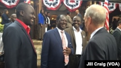 Kenya's opposition leader Raila Odinga speaking to U.S. Ambassador Robert Godec during an election results watch breakfast at the ambassador’s home in Nairobi, Nov. 9, 2016.