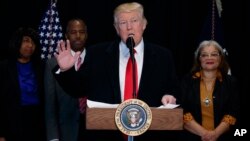 President Donald Trump speaks after touring of the National Museum of African American History and Culture, Feb. 21, 2017, in Washington. 