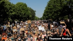 Demonstrators take part in a rally against the death in Minneapolis police custody of George Floyd, in Saint Paul, Minnesota, June 1, 2020.