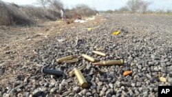 Spent bullet casing litter a road after authorities reported a gun battle with armed men near the beach resort of Mazatlan, Mexico, July 1, 2017. Mexican authorities said at least 19 people died in clashes involving armed men and security forces.