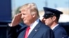 FILE PHOTO: U.S. President Trump returns a salute as he steps from Air Force One to tour the Boeing South Carolina facility in North Charleston