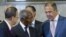Kofi Annan, center, U.N. Secretary-General Ban Ki-moon, left, and Russian Foreign Minister Sergei Lavrov talk before the start of the Action Group on Syria meeting in the Palace of Nations, Saturday, June 30, 2012 in Geneva.