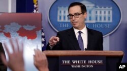 Treasury Secretary Steven Mnuchin calls on a reporter to ask a question during a press briefing at the White House, Jan. 28, 2019, in Washington. 