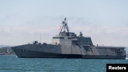 File Photo: The Independence-variant littoral combat ship USS Charleston (LCS 18) sails through San Diego Bay in transit to the ship's Naval Base San Diego homeport in San Diego, California, U.S. in this April 19, 2019 U.S. military handout photo.