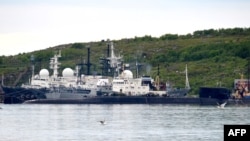 A picture taken July 2, 2019, shows an unidentified submarine in the port of Severomorsk, in Russia.