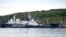 A picture taken July 2, 2019, shows an unidentified submarine in the port of Severomorsk, in Russia.