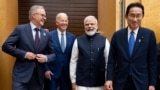 (FILES) US President Joe Biden, Japanese Prime Minister Fumio Kishida, Indian Prime Minister Narendra Modi and Australian Prime Minister Anthony Albanese arrive for their meeting during the Quad Leaders Summit at Kantei in Tokyo on May 24, 2022.