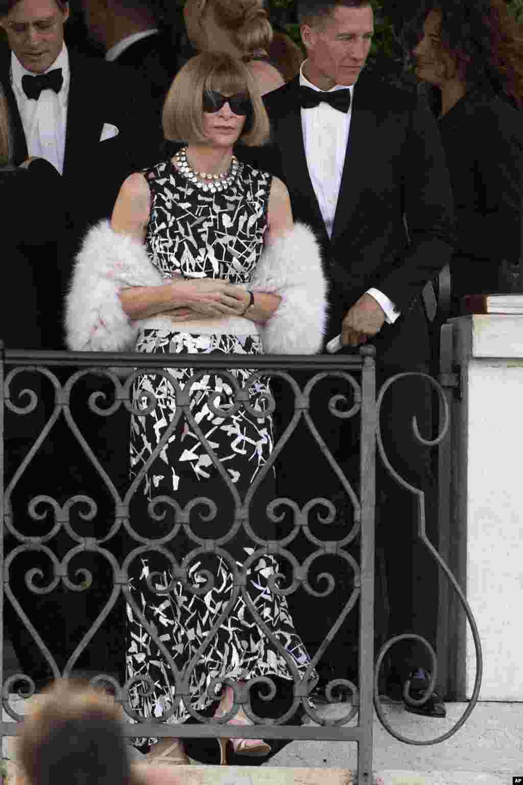 Vogue America chief-editor Anna Wintour leave the Cipriani hotel to go to the George Clooney's wedding with Amal Alamuddin, in Venice, Italy, Sept. 27, 2014.