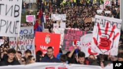 Students march during a student-led 24 hour block on an intersection to protest the deaths of 15 people killed in the November collapse of a train station canopy, in Belgrade, Serbia, Jan. 27, 2025.