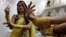 An Indian model displays gold jewelry during a Jewelry and Gem Fair in Hyderabad, India, (File photo).