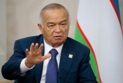 FILE - Uzbekistan's then-President Islam Karimov attends a summit in Ufa, Russia, July 10, 2015.