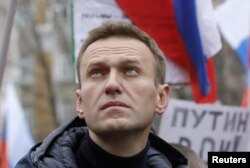 FILE - Pemimpin oposisi Rusia Alexey Navalny menghadiri rapat umum untuk mengenang politisi Boris Nemtsov, yang dibunuh pada tahun 2015, di Moskow, Rusia 24 Februari 2019. (REUTERS/Tatyana Makeyeva)