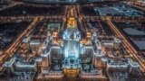 An aerial view taken with a drone in Moscow on January 27, 2018 shows the main building of the Moscow State University, Luzhniki Stadium and the Moskva River. 