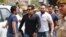 Bollywood star Salman Khan, second left, arrives for court in Jodhpur, Rajasthan state, India, April 5, 2018. Khan was convicted Thursday of poaching rare deer in a wildlife preserve two decades ago and could face up to six years in prison. 