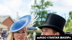 FILE - Peter Phillips and Autumn Phillips at Royal Ascot Day Two at Ascot Racecourse, June 20, 2018. 