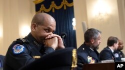 US Capitol and Washington Metropolitan police officers testify before the House select committee hearing on the Jan. 6 attack on Capitol Hill, July 27, 2021.