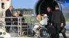 Pope Francis seated on a wheelchair boards his plane heading to Luxembourg on September 26, 2024 at Rome's Fiumicino airport.