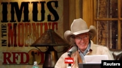 Radio personality Don Imus talks on air during his return to radio in New York, Dec. 3, 2007. Imus returned to the airwaves, after nearly an eight month absence, promising to keep his edgy tone but refrain from the kind of racist and sexist comments that got him fired.