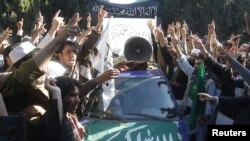 Afghan protesters shout slogans during a pro-Palestinian demonstration in Jalalabad November 26, 2012. A truce was brokered by Egypt last Thursday after a week of fighting between Israel and Palestinians in Gaza. REUTERS/Parwiz (AFGHANISTAN - Tags: CIVI