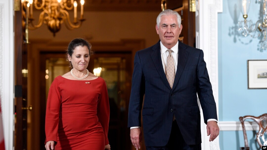 FILE - Secretary of State Rex Tillerson walks with Canadian Foreign Minister Chrystia Freeland at the State Department in Washington, Oct. 11, 2017. 