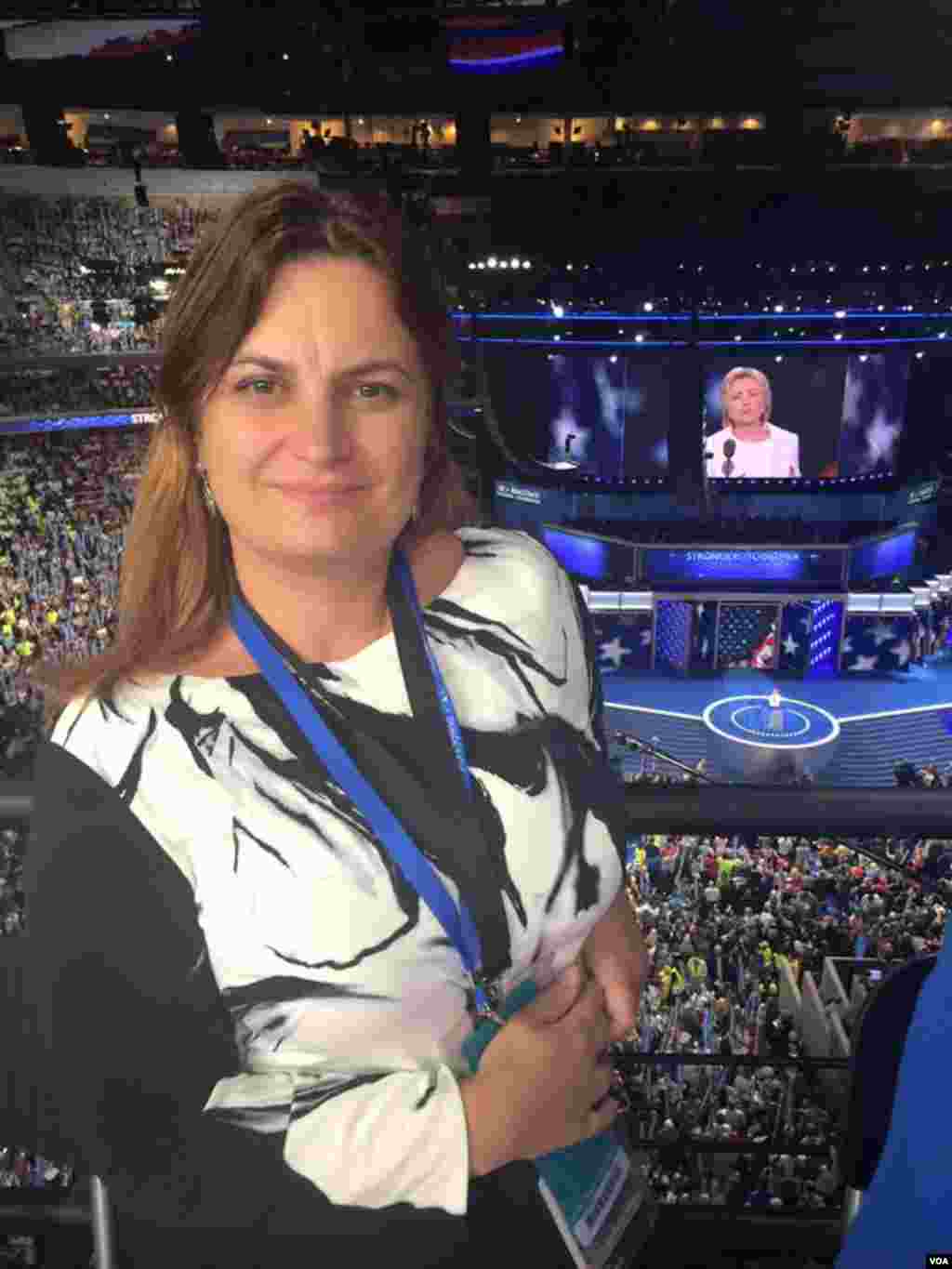 VOA Albanian's Keida Kostreci as Hillary Clinton speaks on the stage at the DNC. 