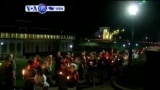 VOA60 America - Hundreds hold a candlelight march and vigil in the U.S city of Charlottesville, Virginia