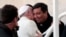 Fabian Baez, a priest from a church in downtown Buenos Aires, is greeted by Pope Francis at the end of the Wednesday general audience in Saint Peter's square at the Vatican, Jan. 8, 2014.