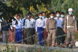 Students, who had been arrested for taking part in a demonstration against the military coup, are released from prison in Naypyidaw, Myanmar, Feb. 15, 2021.