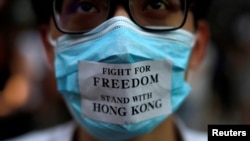 A masked anti-government protester is pictured in Central Hong Kong, Oct. 4, 2019. 