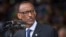 FILE - Rwandan President Paul Kagame addresses the public and dignitaries at a ceremony to mark the 20th anniversary of the Rwandan genocide, at Amahoro stadium in Kigali, Rwanda.