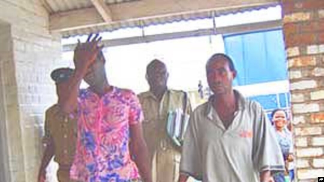 Tiwonge Chimbalanga and Steven Monjeza are taken into custody after celebrating their engagement