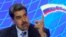 El presidente Nicolás Maduro habla durante una reunión en el palacio de Miraflores en Caracas con la primera ministra de Barbados, Mia Mottley. el pasado 8 de julio. El mandatario firmó este mes un decreto sobre exoneraciones tributarias para importaciones de bienes al país.
