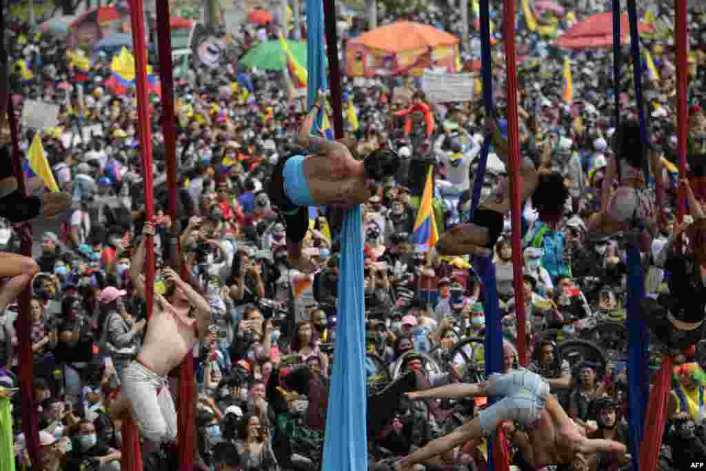 Artists perform as they take part in a protest against the government of Colombian President Ivan Duque, in Bogota, May 15, 2021. 