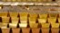 FILE - Gold bars are stacked in a vault at the United States Mint in West Point, New York, July 22, 2014. Some African nations' central banks are buying gold to bolster and protect their economies, experts say.