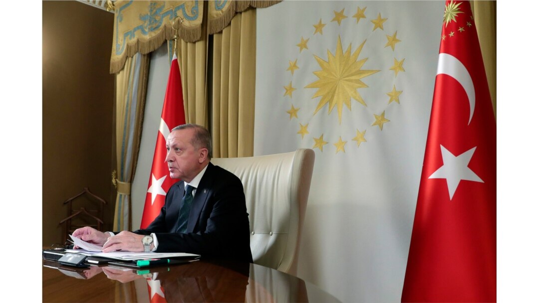 Turkish President Recep Tayyip Erdogan participates in a teleconference with European leaders, in Istanbul, Tuesday, March 17, 2020.