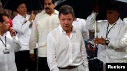 Colombian President Juan Manuel Santos, seen here in Puerto Ayacucho July 22, 2013, is in talks to end five decades of conflict with the Revolutionary Armed Forces of Colombia (FARC).